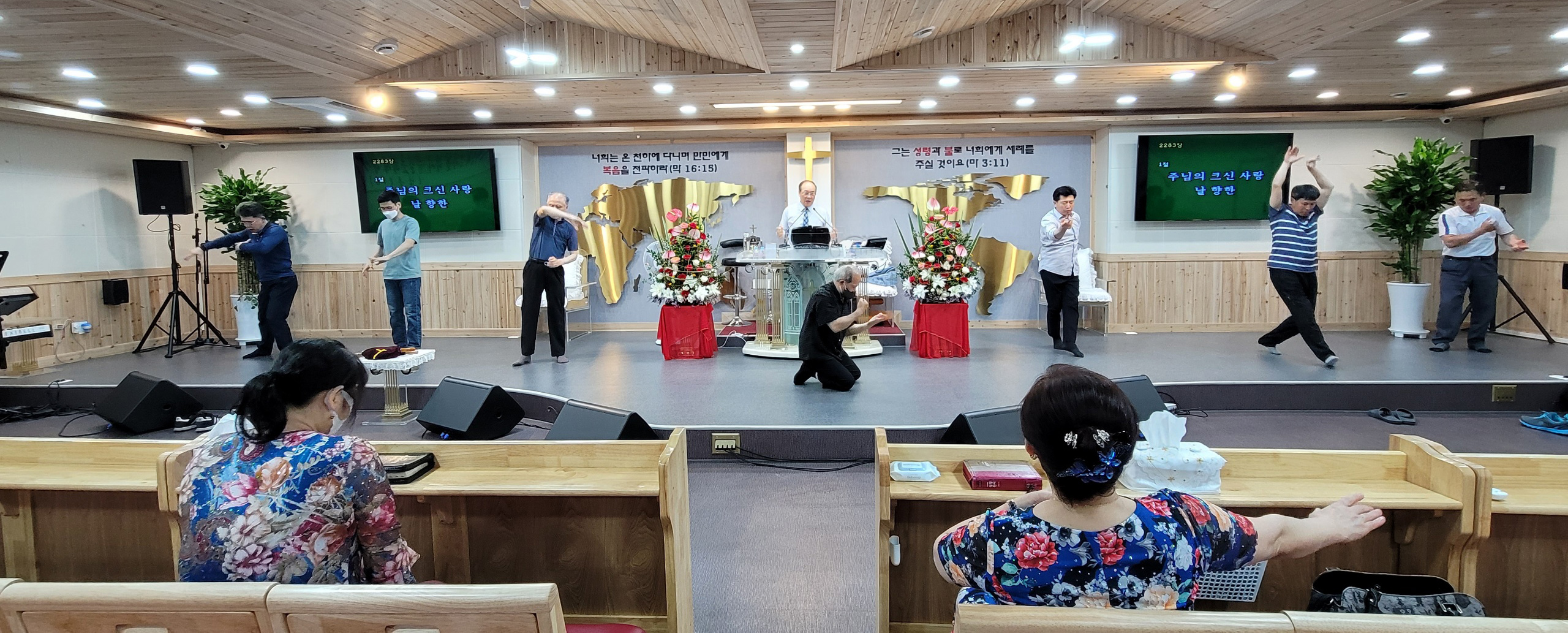 The men also dance before The Lord, as Pastor Yong Doo Kim is singing a song in Korean.